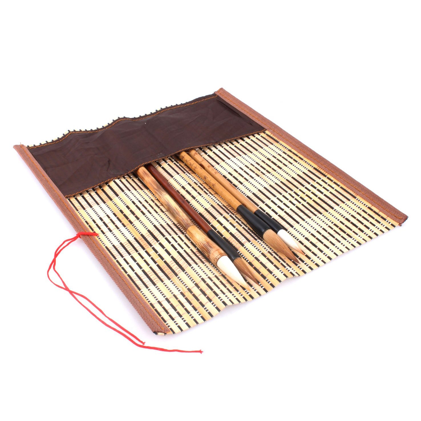 usage view of the bamboo brush wrap with pocket. This product is made of bamboo strips with a cloth pocket at one site where your brushes could be well positioned and protected inside