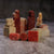 Oriental Seal Stone Chop Assortment with chops being visible from the bottom showing the red ink on the custom-carved base