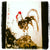Carmen Moreno, the oriental brush painting instructor and artist from Grenada in spain painting a waking rooster in Chinese Ink and Wash or Sumi technique