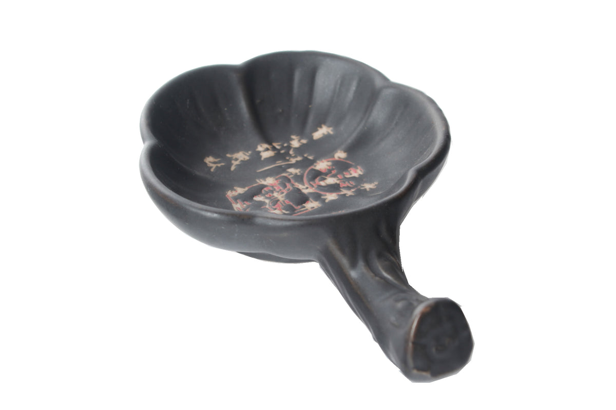 Chinese &amp; Japanese traditional brush painting ink well &amp; brush rest in black color with a shape like a plum flower.