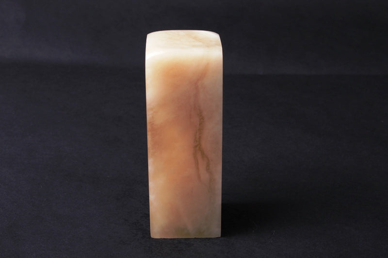 Natural crystal pale yellow colored chinese kunlun seal stone with hand carved Pixiu header for martial art chopping