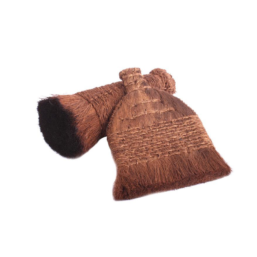 Hand made palm fiber hard mounting brush used to apply backing paper on the back of a sumi or calligraphy artwork which you prepare in a wet mounting process.