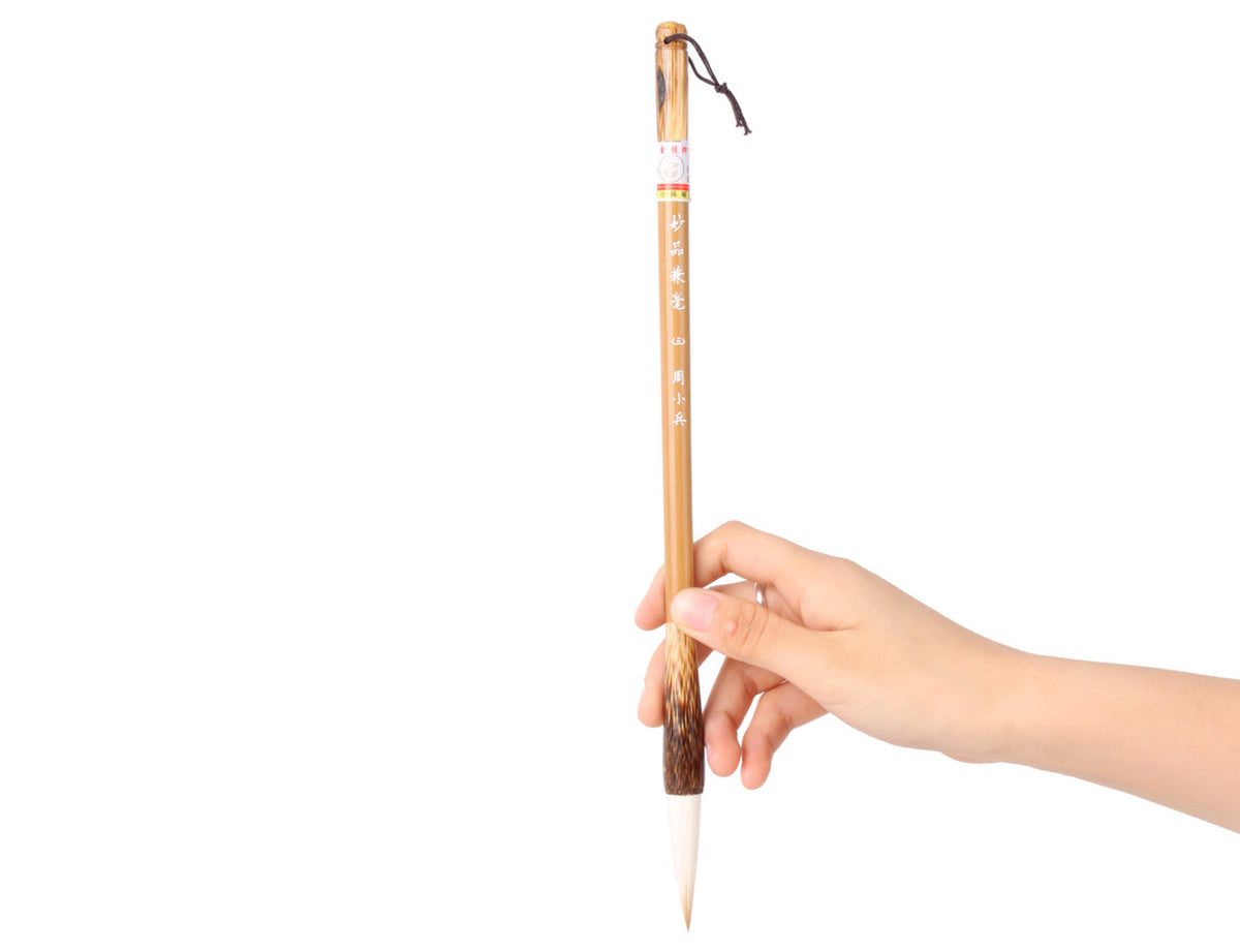 holding this brush firmly just above the brush tip, you are ready to start your most amazing bamboo sumi painting creation!