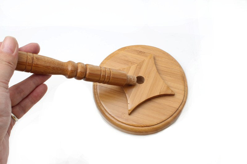 Traditional Chinese on a brush rack made with   bamboo to hang calligraphy and sumi brushes for   storage and display.