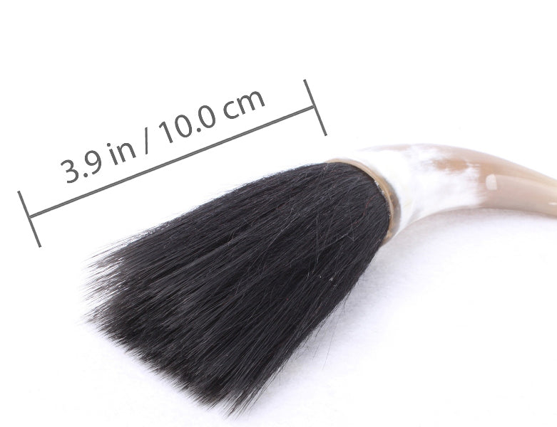 close-up picture of the tip of this mongolian steppe bull horn brush with indicated dimensions in inch and centimeter