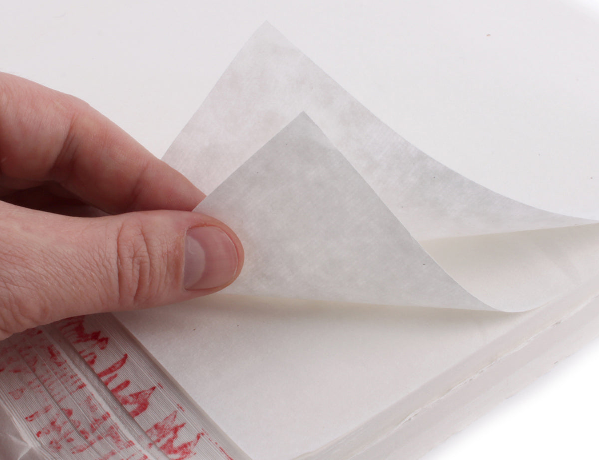 Close up zoom picture of our semi-sized Huangshan rice or shuen paper for shodo calligraphy and sumi painting displaying the paper structure and thickness