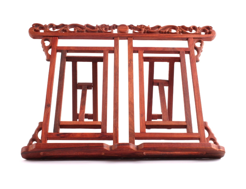 Foldable Chinese book stand for positioning sumi painting books and calligraphy learning material made of wood and hand carved with dragons