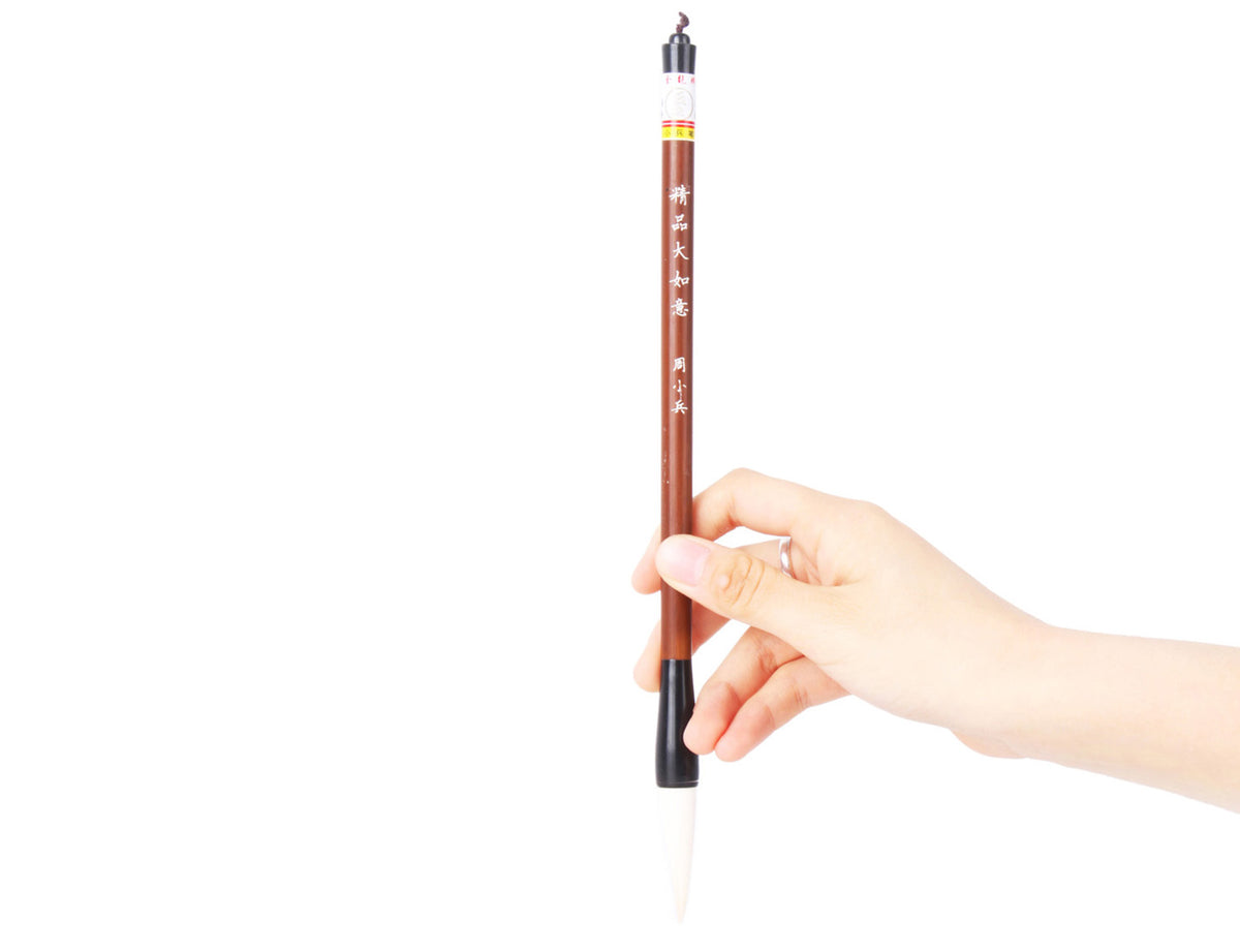 using your hand to gently hold it by about two fifths of its handle, you are ready to start your own personal caligraphy or sumi creation journey