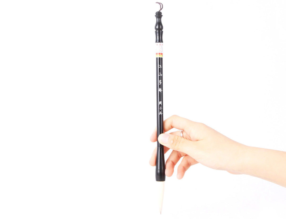 usage view showing how to hold this shanshui landscape master mixed hair calligraphy brush