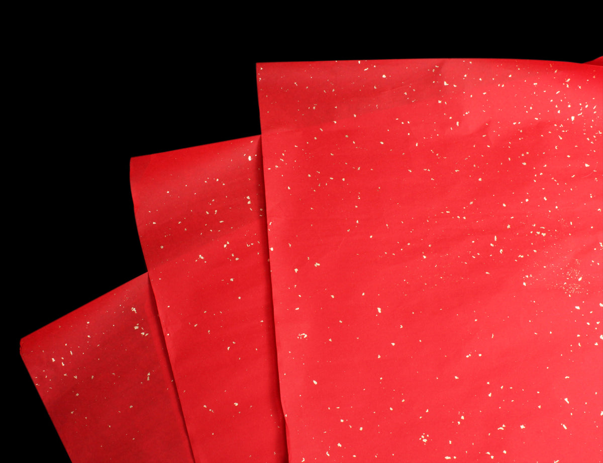 artsy picture of the paper Red Golden Rain | Gold Speckled Shuen Decorative Paper which can be used for not only calligraphy writing but also for sumi painting