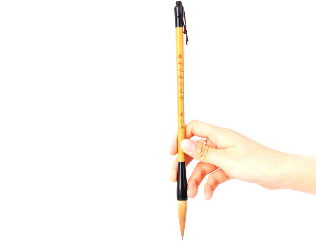 holding it firmly you can start your art creation with this brush and find yourself amazed by the wonderful and artsy effect it brings especially when painting orchid amd bamboo