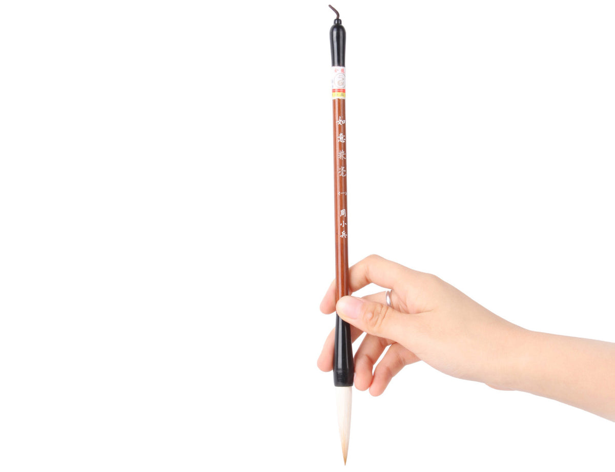 using your hand to gently hold it by about two fifths of its handle, you are ready to start your own personal caligraphy or sumi creation journey