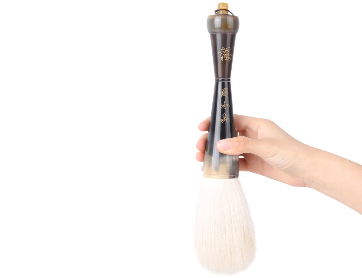 usage view showing how to hold this happiness highland goat hair brush for your sumi-e and calligraphy art creation