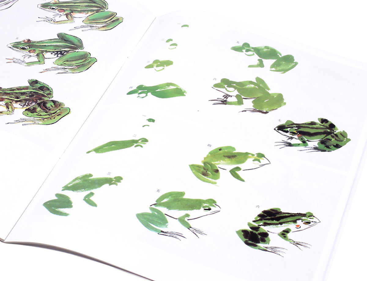 detail view of how a frog is painted in sumi-e step by step