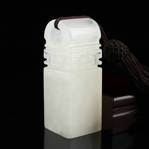 Martial art dojo certificant seal chop stone with a hand carved Chinese fortune sign.