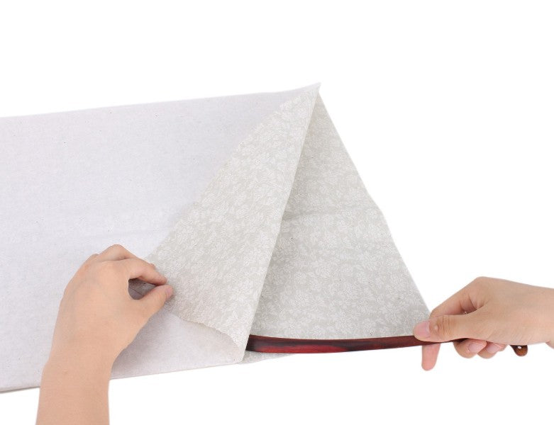 a high quality wooden xuan paper cutting knife   made of the qingtan tree which whose bark is the   main material to make the finest xuan paper