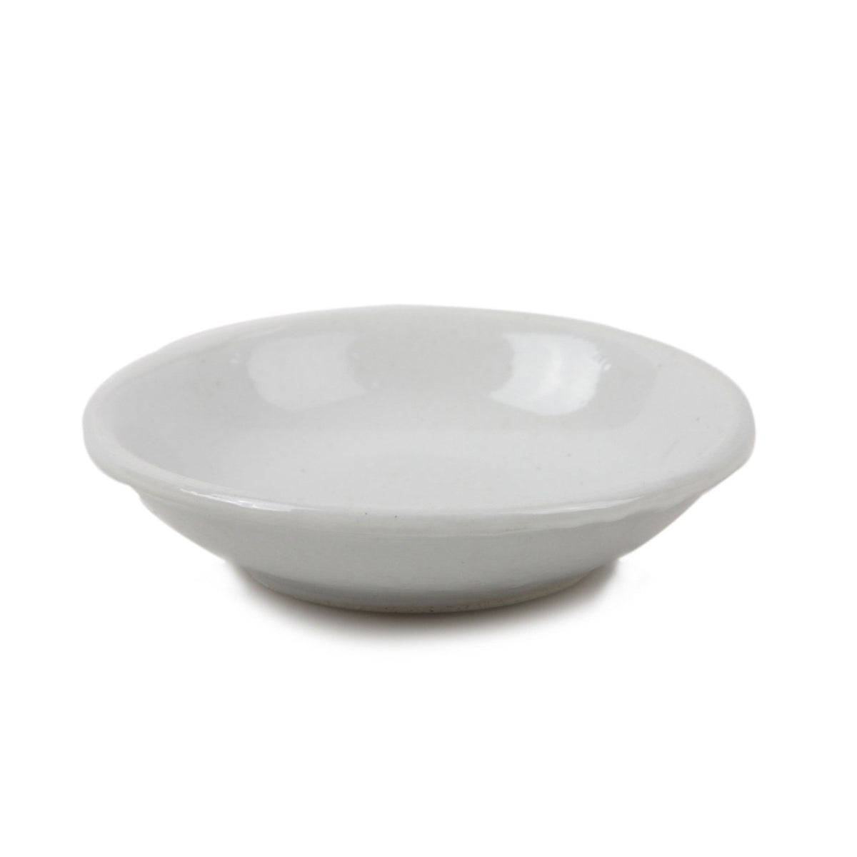 Traditional white Porcelain Chinese ink container used to ready sumi and calligraphy ink for painting and writing together with bottle of Oriental sumi ink