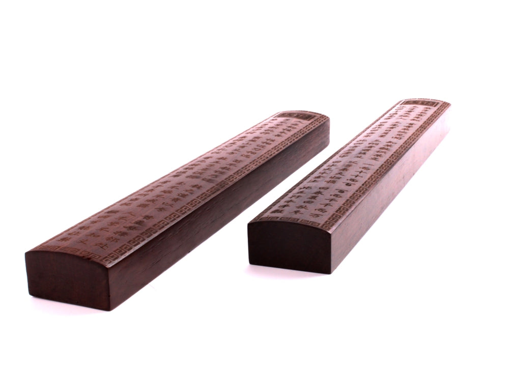 Set of dark catalpa wood Oriental paper weights for flattening sumi and calligraphy painting, decorated with Chinese hand carved ornaments and a carved calligraphy characters of classic texts