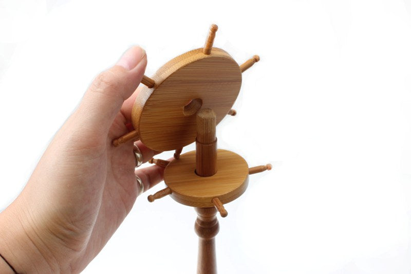  Bamboo made oriental brush hanger with 2   spinning wheels to hang 11 brushes on different   hooks