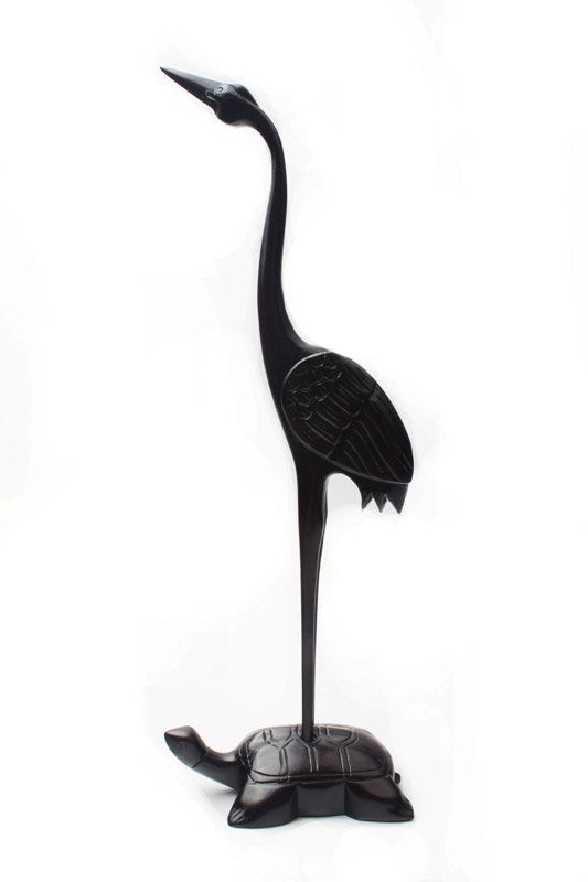 chinese wooden handicraft - an elegant crane made   of a whole piece of wood for you to hang up and   stock your brush painting brushes when they are   not in use