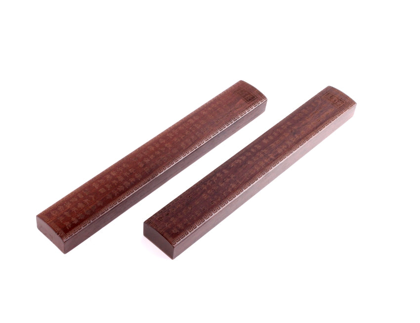 Set of dark catalpa wood Oriental paper weights for flattening sumi and calligraphy painting, decorated with Chinese hand carved ornaments and a carved calligraphy characters of classic texts