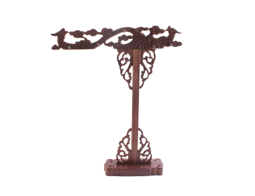 Front image of wooden hand-carved calligraphy brush hanger in classical Chinese style